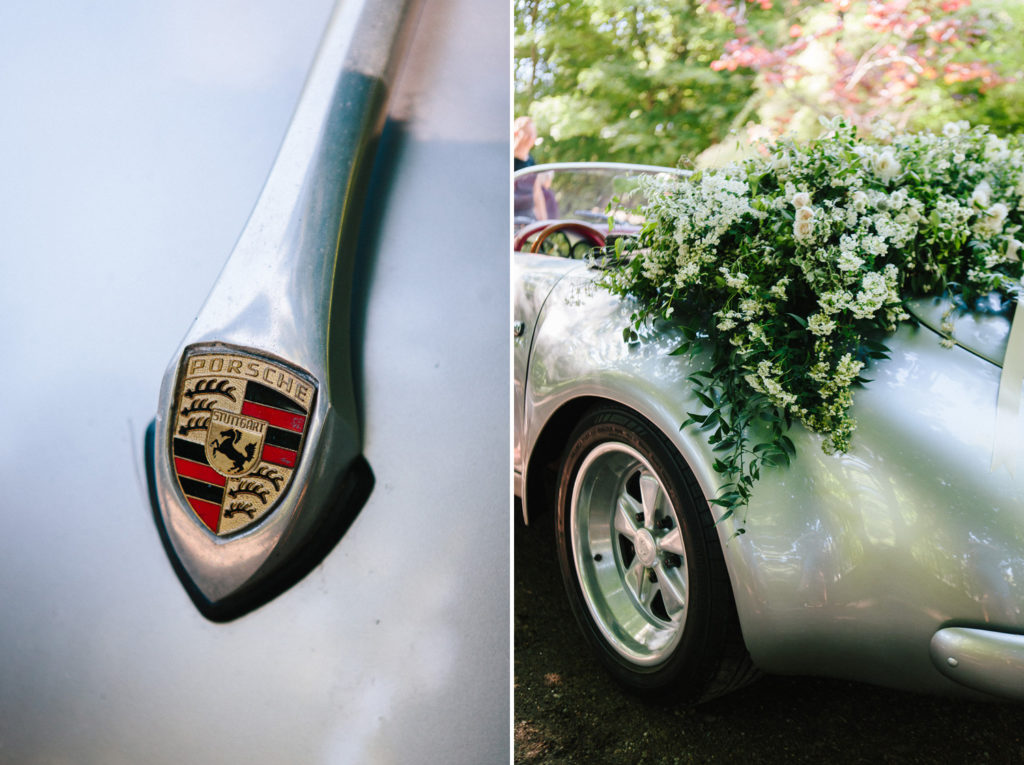 A luxury floral arrangement on a classic silver Porsche