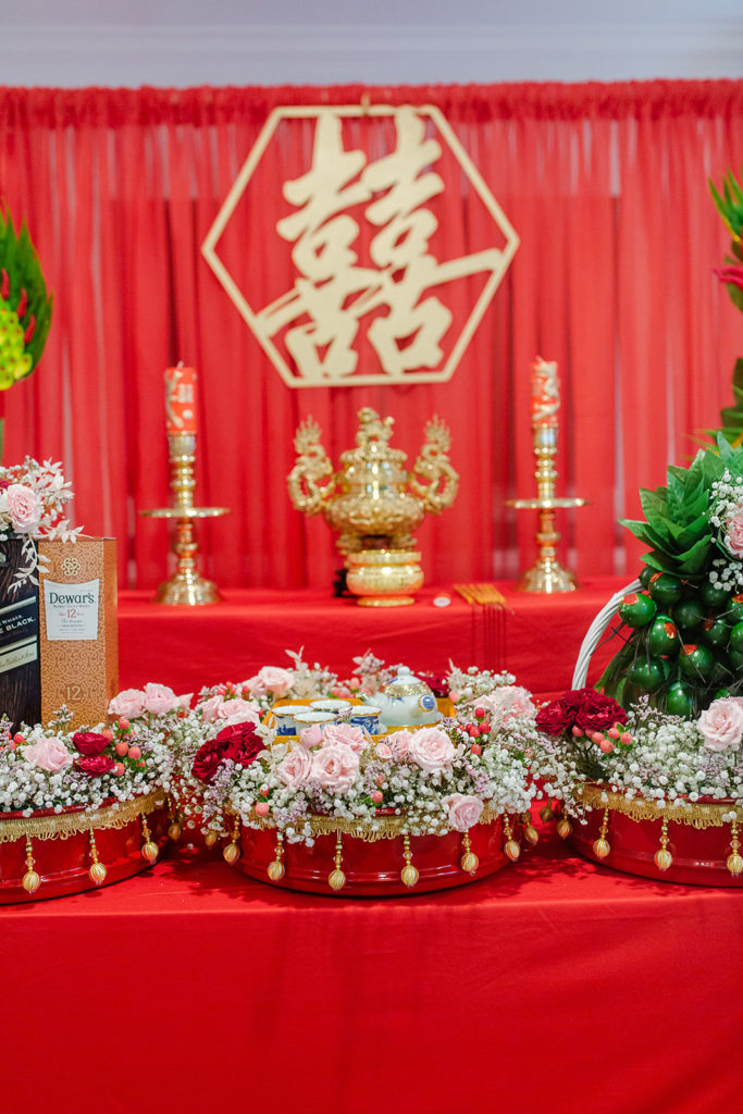 altar draped in red for a traditional Vietnamese wedding tea ceremony