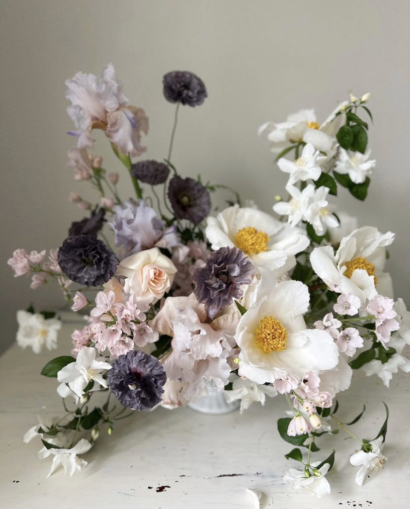 Compote floral arrangement in pink, white, and smoky lavender by Florist Brooke Snodgrass of Seventh Stem