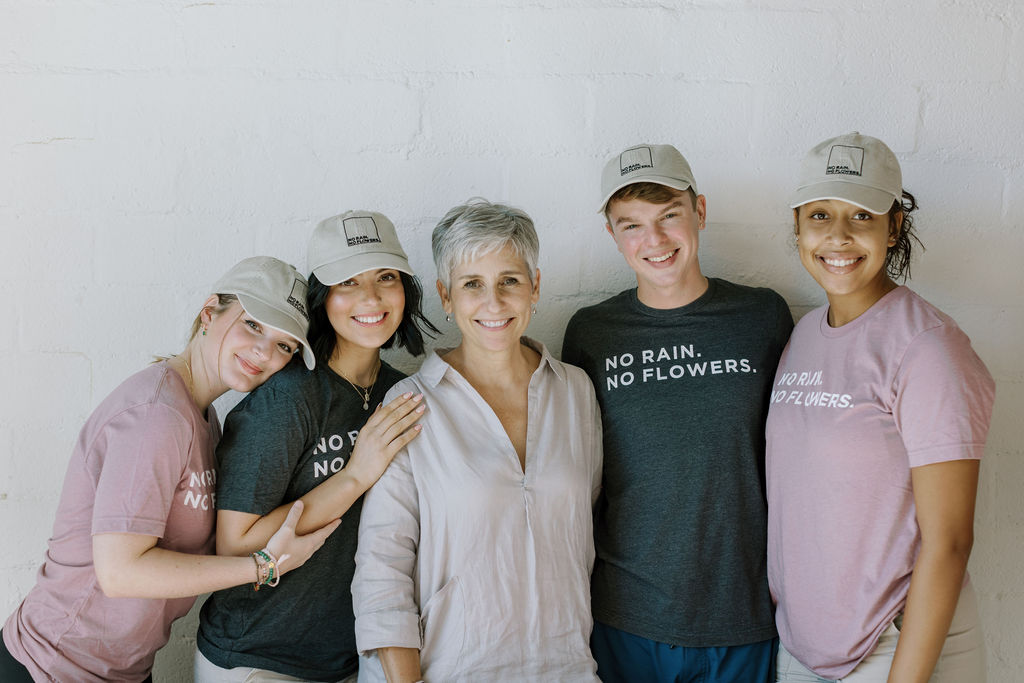 The Botanical Brouhaha teen apprentice staff standing in their office.