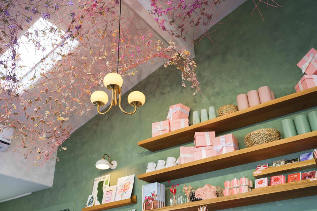 Shelving and ceiling installation in Native Poppy flower shop 